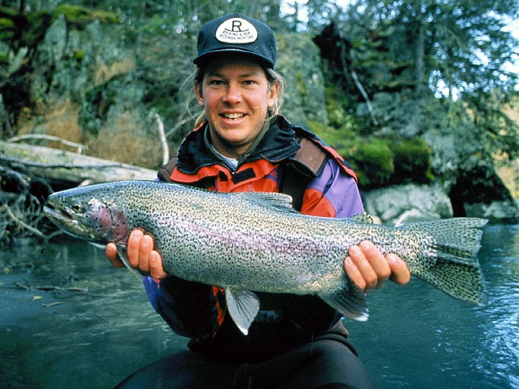 Rainbow trout happy fisherman