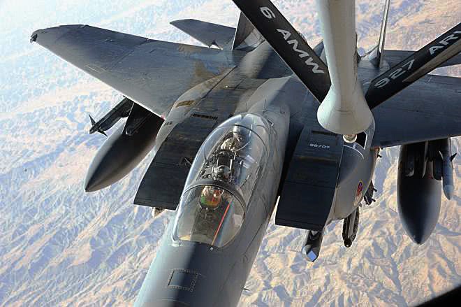 Stratotanker refuels an F-15E in flight USAF