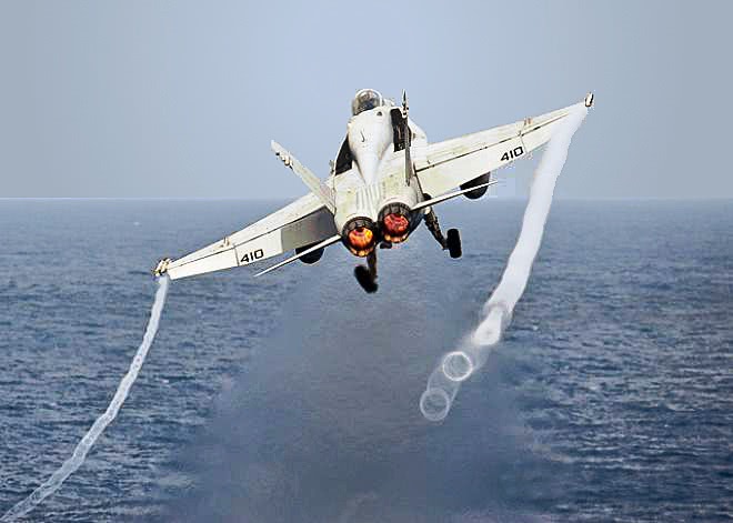 Hornet launching off carrier