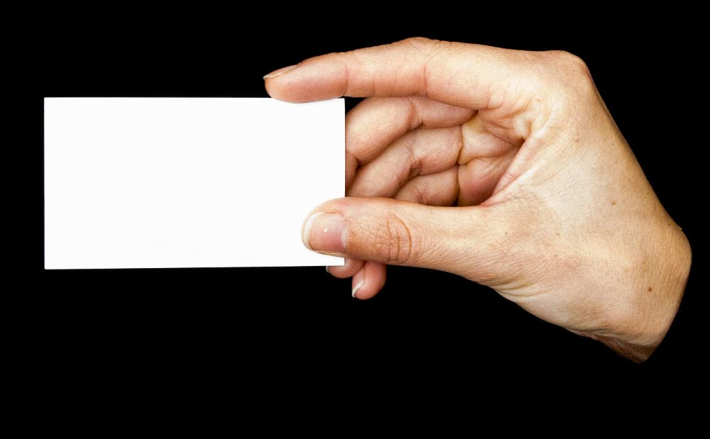 holding business card