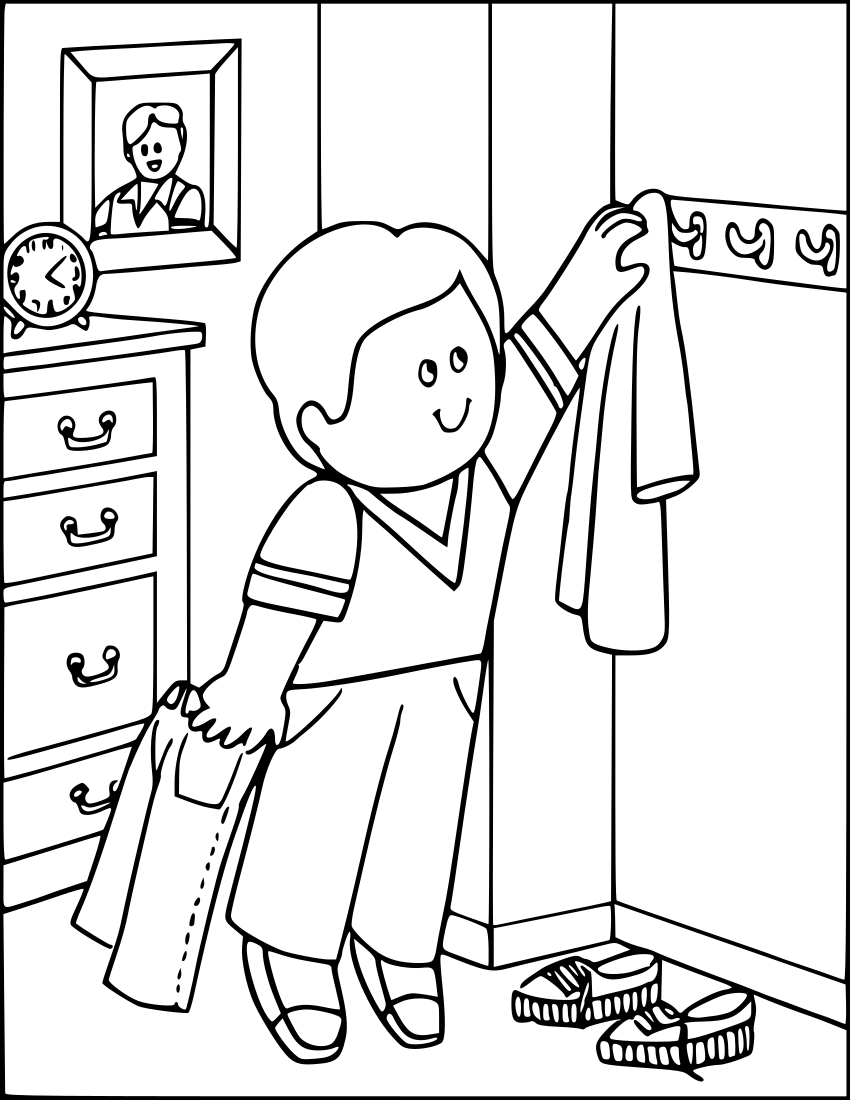 boy hanging up clothes