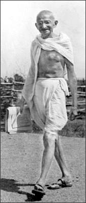 Mohandas Gandhi walking