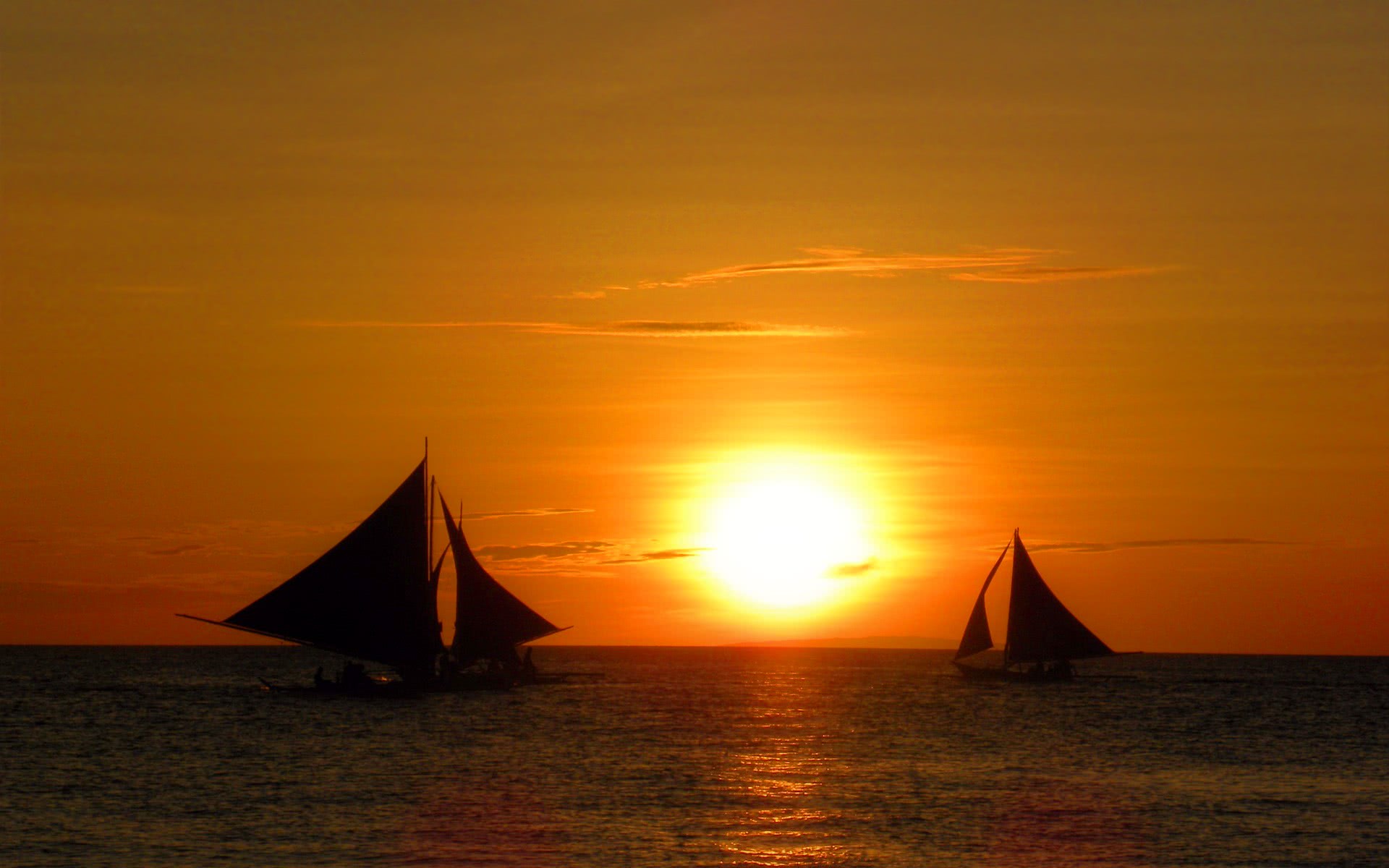 sunset sailboats wide