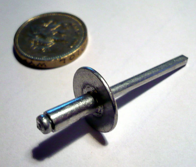Pop rivet with large head alloy
