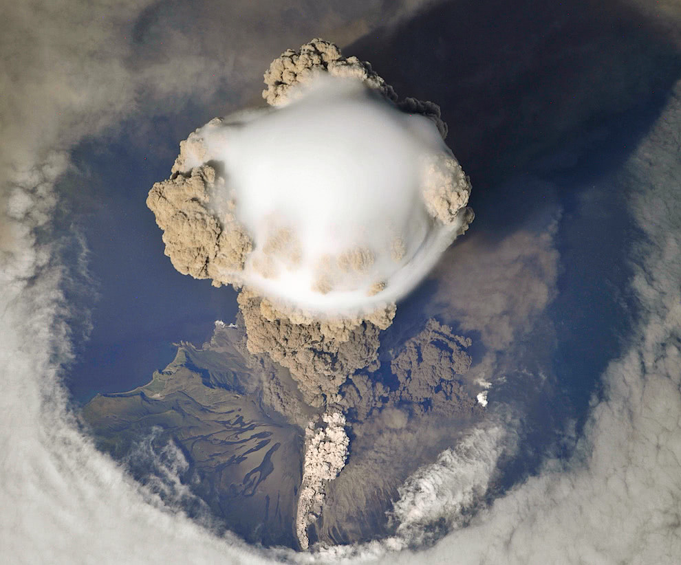 Pileus cloud forming atop eruption